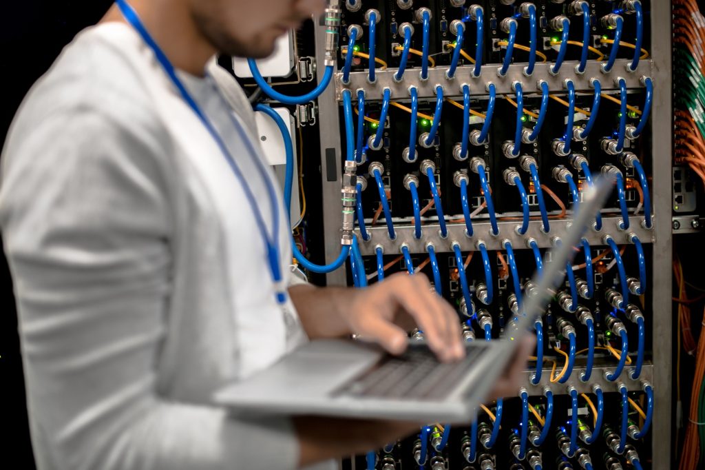 Man Managing Supercomputer Servers